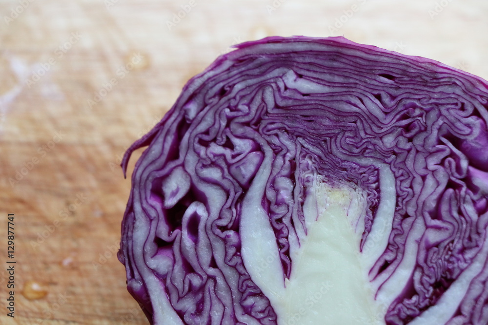 Obraz premium Closed up purple cabbage fresh vegetable for good health on the wood block 