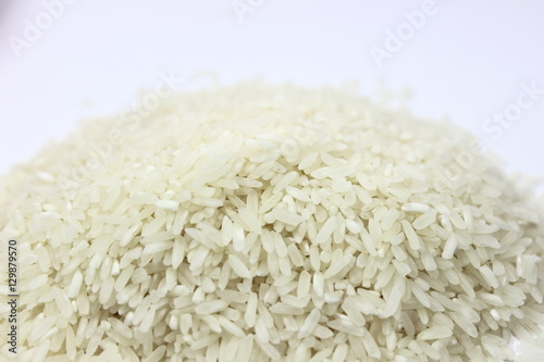 white rice, natural long rice grain for background and texture