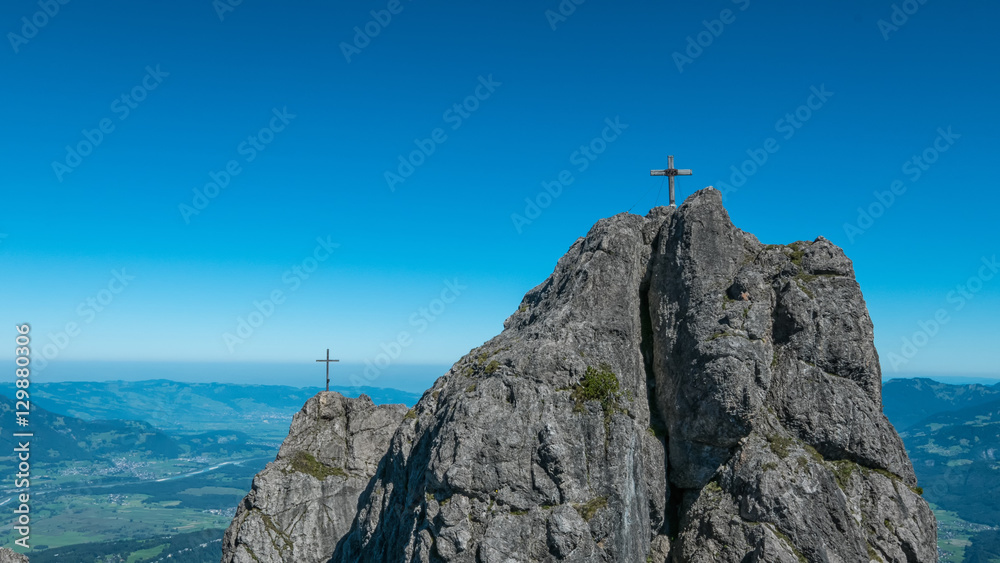 Crucifix on mountain peak
