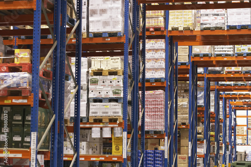 Fotografie View of shelves in warehouse full of merchandise