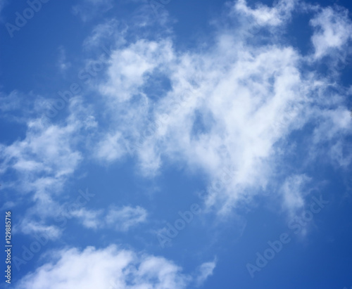 blue sky with white fluffy clouds