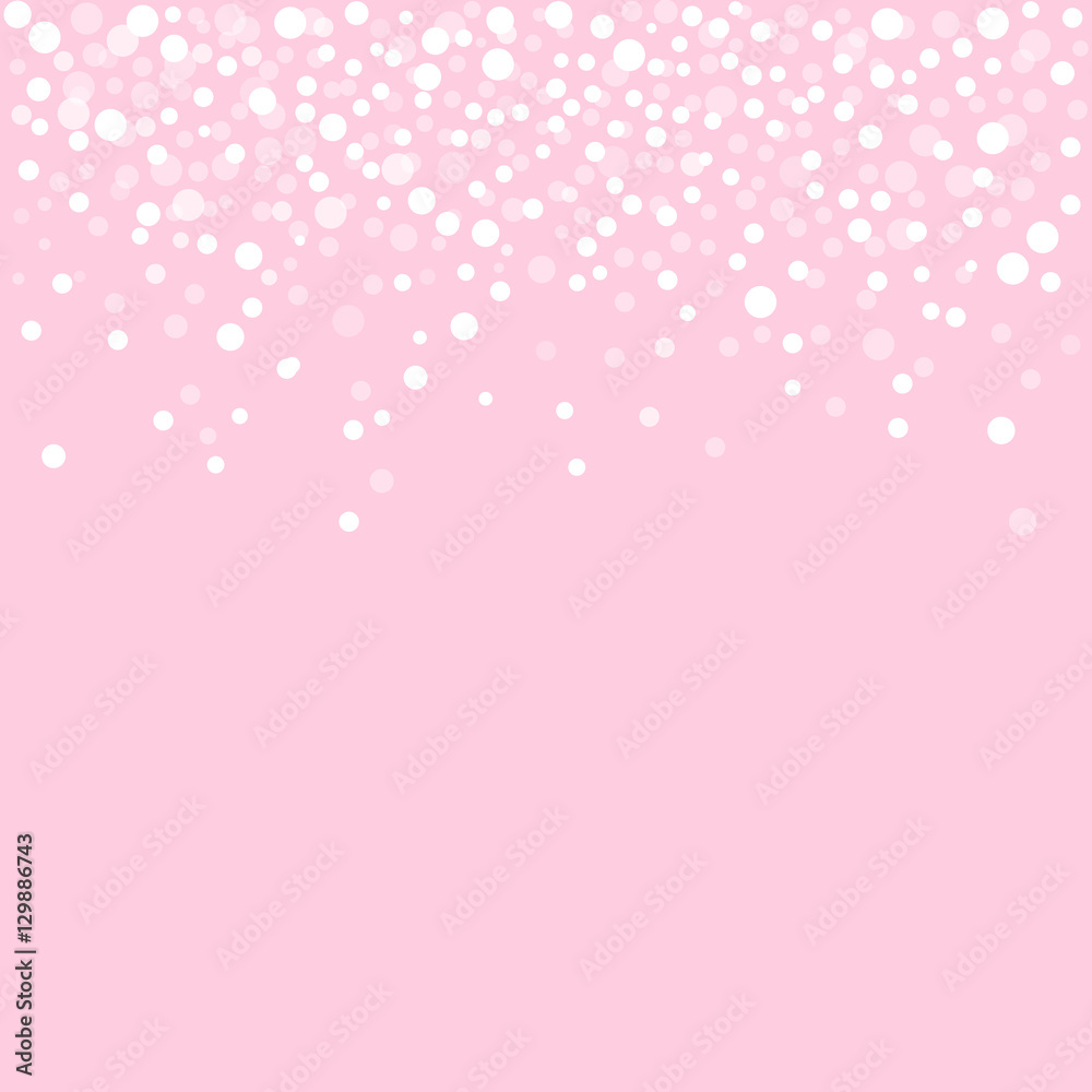 Falling snow on a light pink background. Winter background