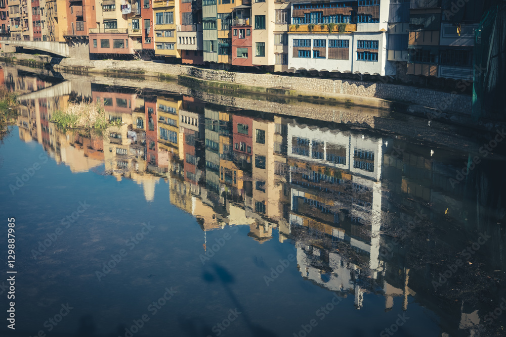 River houses water reflection in Girona, Catalonia