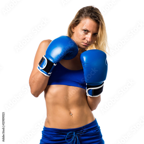 Pretty blonde woman with blue boxing gloves © luismolinero