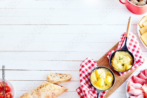 Photography Swiss raclette cheese corner border with copyspace