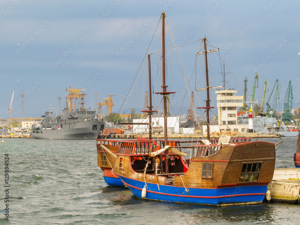 Modern and ancient ships in the harbour of the Sea Port Varna, Bulgaria Modern and ancient ships in the harbour of the Sea Port Varna, Bulgaria