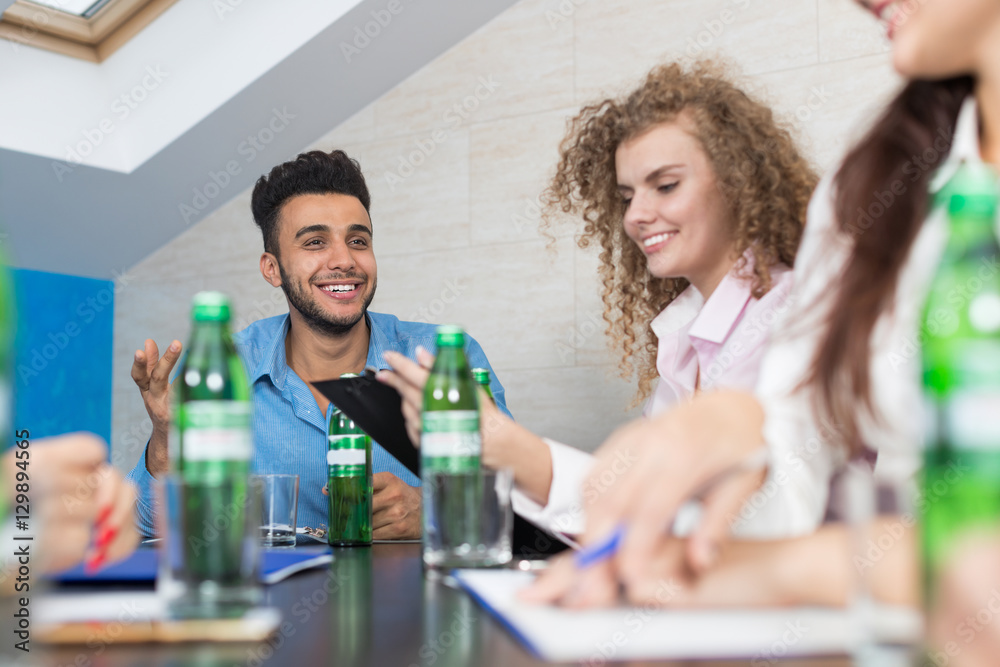 Business People Group Sit At Office Desk Meeting, Young Smiling Businesspeople Team Conference Discussion Project Mix Race People Cooperation Business People Group Sit At Office Desk Meeting, Young Smiling Businesspeople Team Conference Discussion Project Mix Race People Cooperation