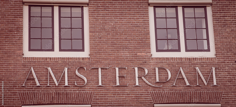 Amsterdam on a building Amsterdam on a building