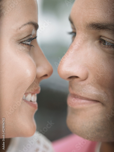 Closeup of a young couple face to face
