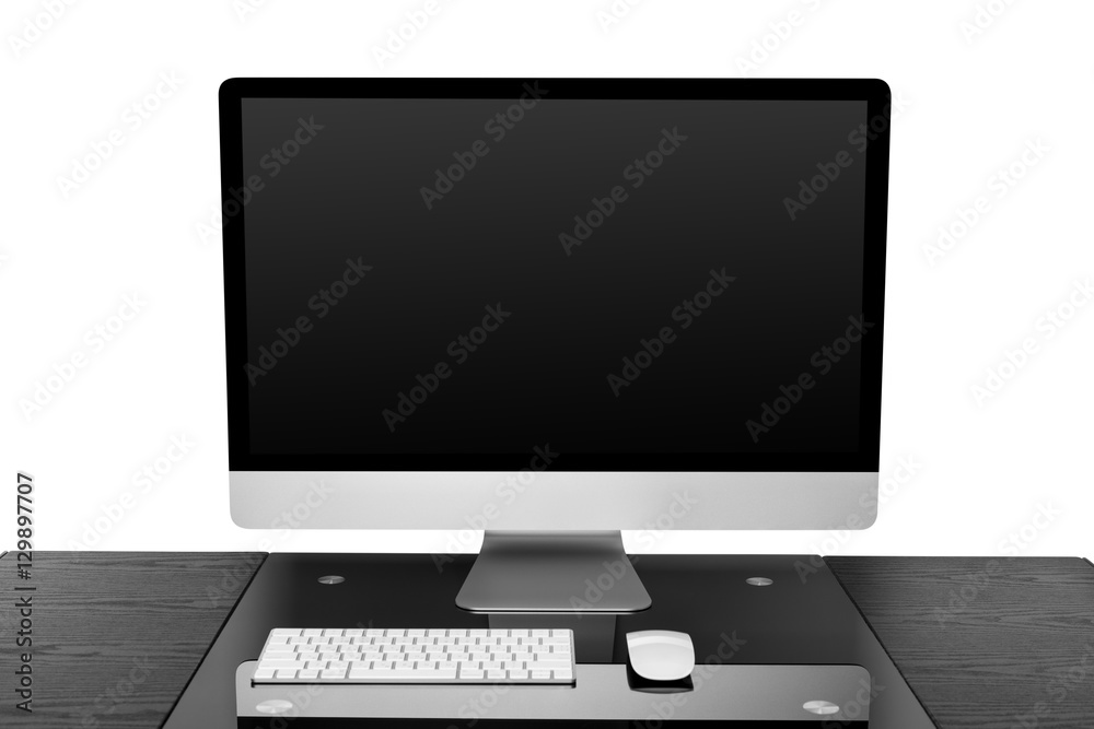 computer on a table in an office