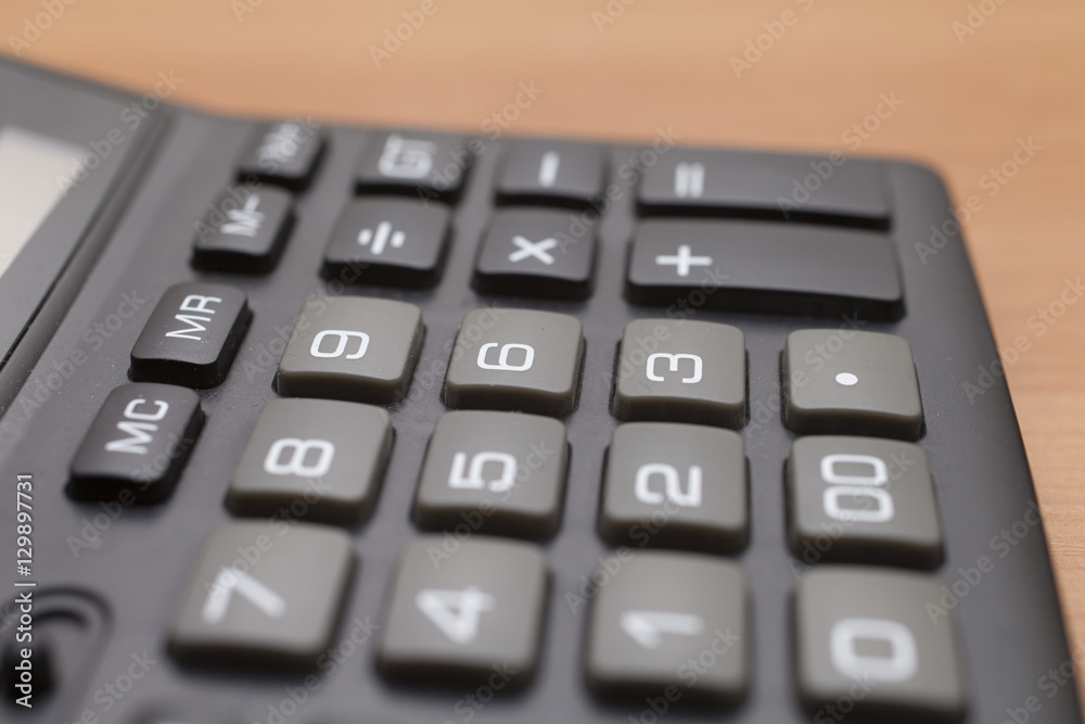 The calculator on a table The calculator on a table