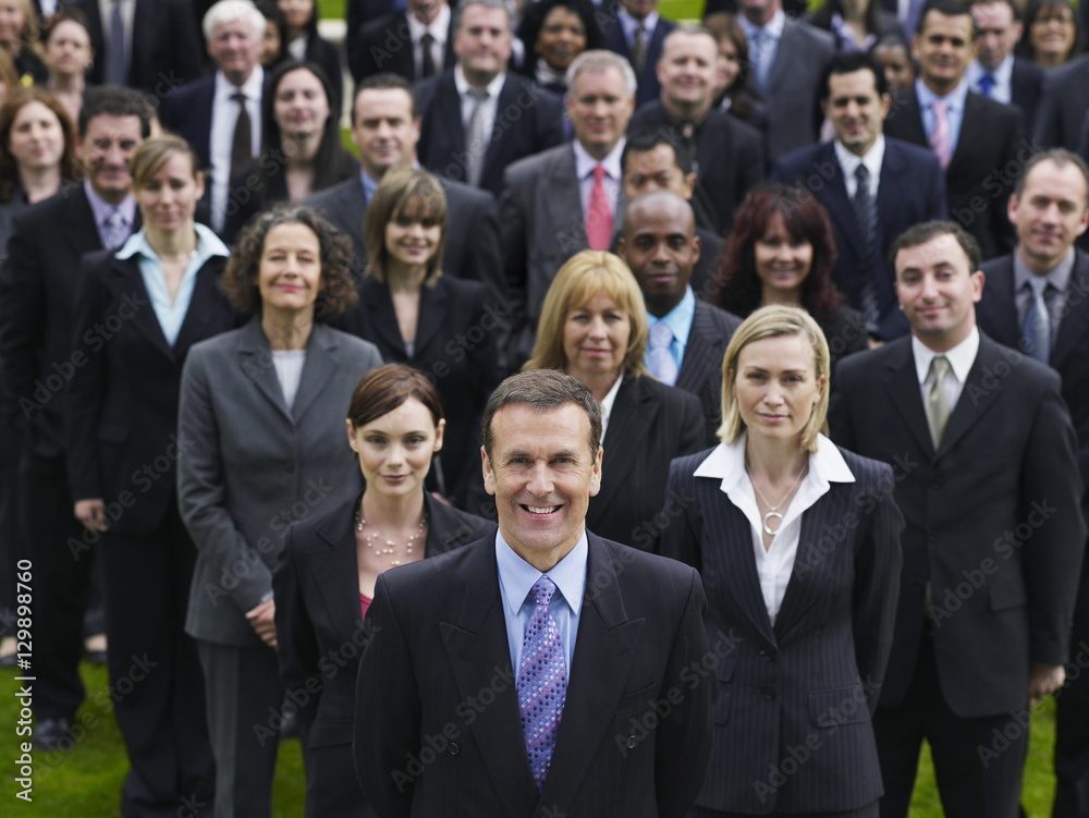 Portrait of a confident businessman with multiethnic team Portrait of a confident businessman with multiethnic team