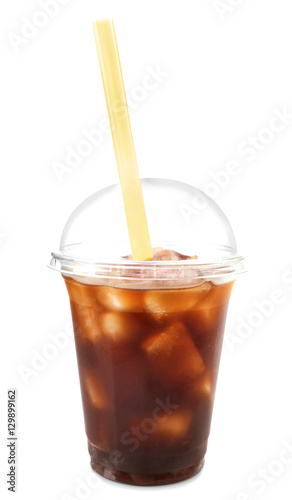 Plastic cup of iced coffee and straw on white background