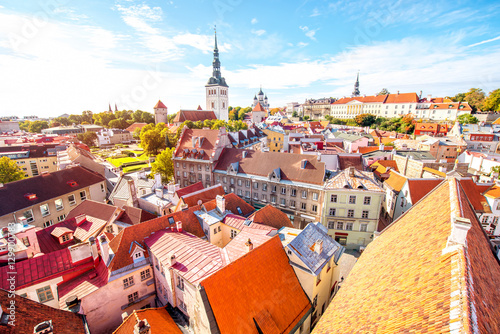 Cityscape aerial view on the old town with saint Nicholas church tower and Toompea hill in Tallin, Estonia