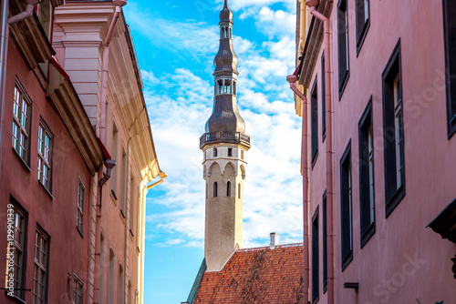 Street view with the town hall's tower on the central square in Tallinn, Estonia photo