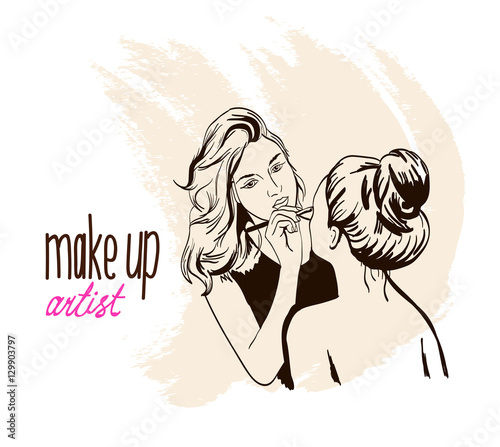 Woman makeup makeup artist paints on the face of his client.