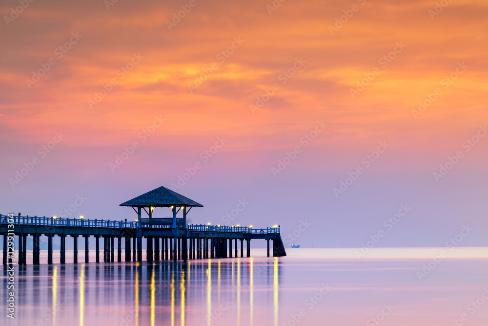 Summer, Travel, Vacation and Holiday concept - Wooden pier between sunset in Phuket, Thailand Summer, Travel, Vacation and Holiday concept - Wooden pier between sunset in Phuket, Thailand