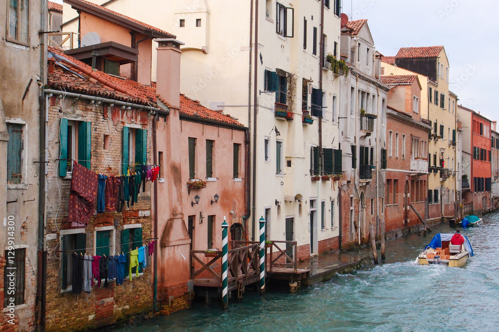 Street in Venice, Italy. Venice city famous channel lifestyle. View of usual Venice street river.