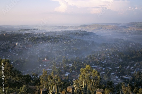 Aerial view of the town, with early morning mist, taken from Goha Hotel, Gondar, Ethiopia photo