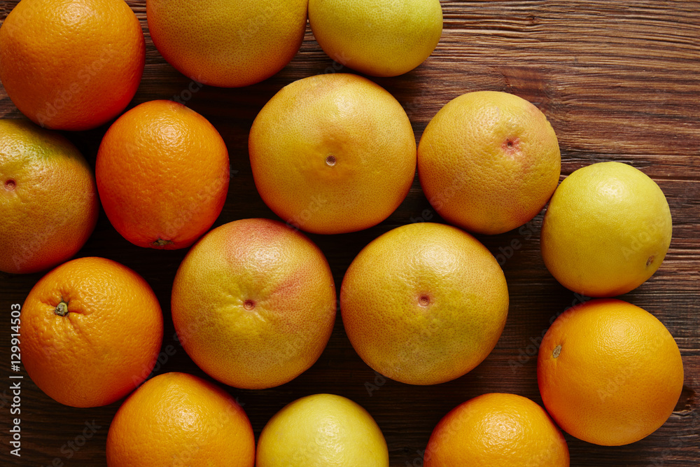 a bunch of citrus fruit orange grapefruit and sweaty. a bunch of citrus fruit orange grapefruit and sweaty.