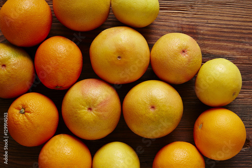 a bunch of citrus fruit orange grapefruit and sweaty.