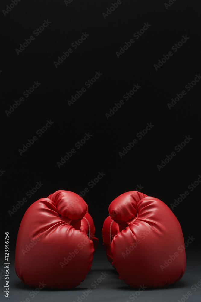 Pair of red boxing gloves