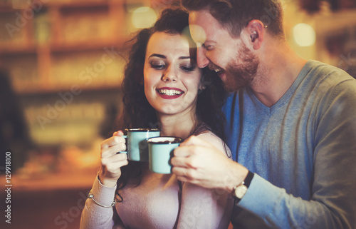 Couple dating in restaurant at xmas