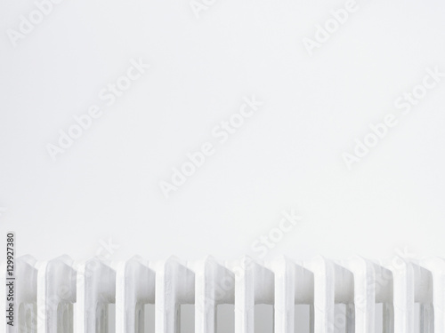 Close up of radiator against white wall