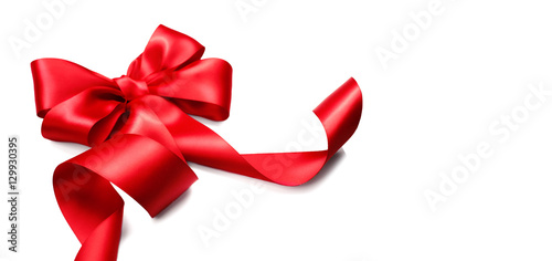 Red satin gift bow. Ribbon isolated on white background