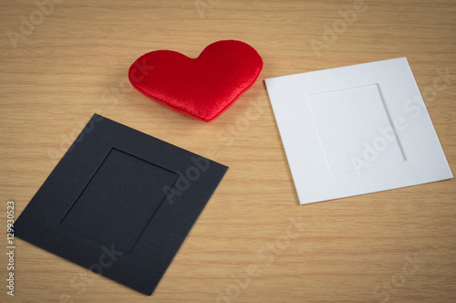 Red heart with paper card