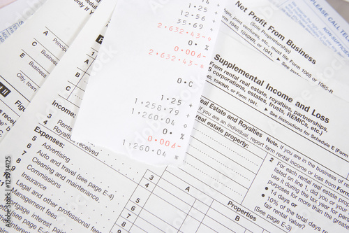 Closeup of tax forms with receipt