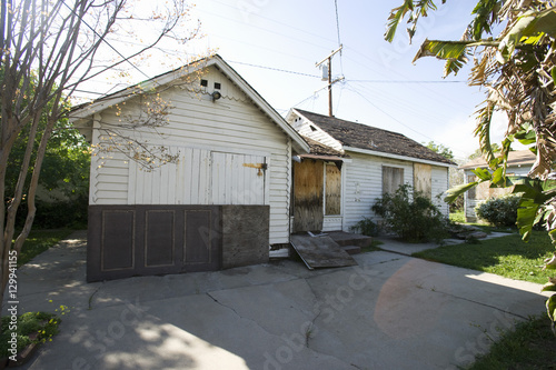 Εκτύπωση καμβά Exterior of an abandoned house with boarded up door
