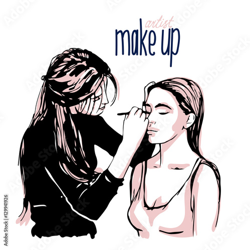 Woman makeup makeup artist paints on the face of his client.