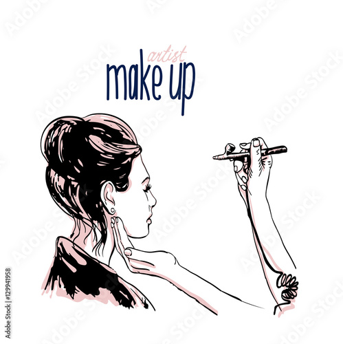 Woman makeup makeup artist paints on the face of his client. 