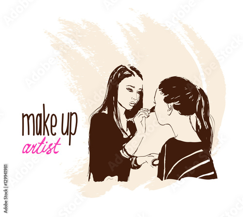 Woman makeup makeup artist paints on the face of his client.