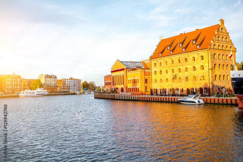 Obraz premium View on Motlawa river and riverside on the sunset in Gdansk, Poland