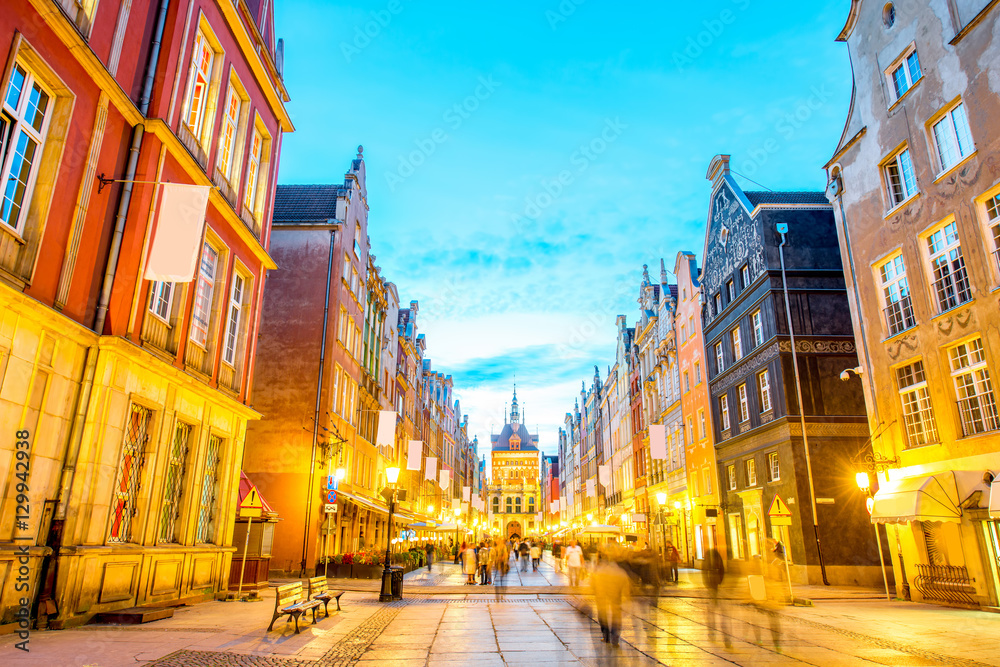 Naklejka premium Night view on the illuminated main street in the center of the old town in Gdansk, Poland