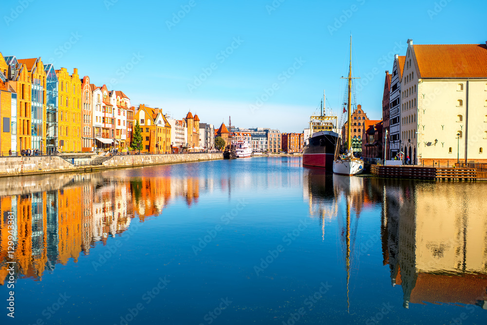 Morning view on the riverside of Motlawa river with beautiful buildings of the old town in Gdansk, Poland