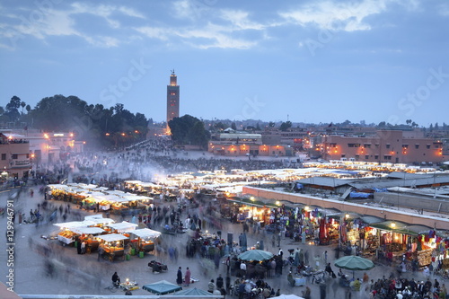 Djemma el Fna square and Koutoubia Mosque at dusk, Marrakech, Morrocco photo