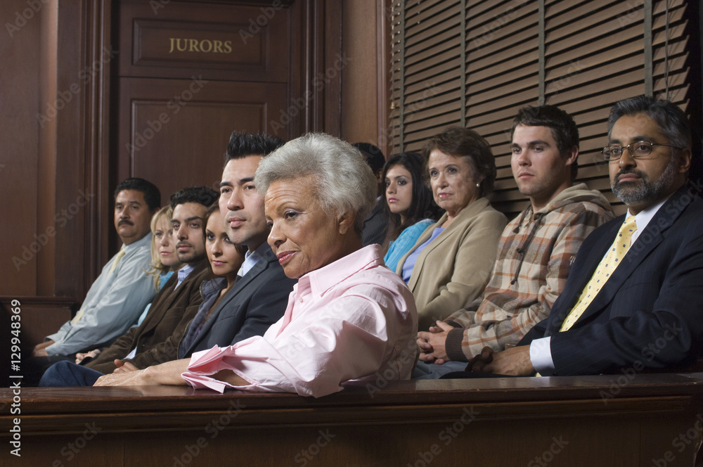 Diverse group of jurors sitting in jury box of a courtroom - obrazy, fototapety, plakaty 