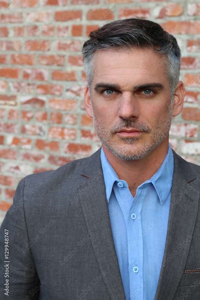 Stern looking businessman close up Stern looking businessman close up