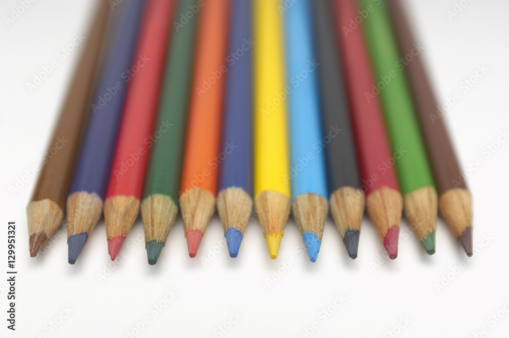 Set of colorful pencils in a line over white background Set of colorful pencils in a line over white background
