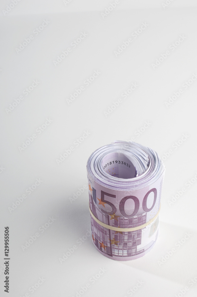 Rolled up Euro currency isolated over white background Rolled up Euro currency isolated over white background