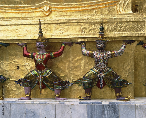 Detail of mythological figures at the Temple of the Emerald Buddha (Wat Phra Kaeo) (Wat Phra Kaew) in the Royal Palace area, Bangkok photo