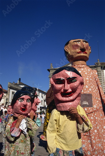 Masks and Giants parade, Romaria da Seniora d'Agonia, Viana do Castelo, Minho, Portugal, Eurpoe photo