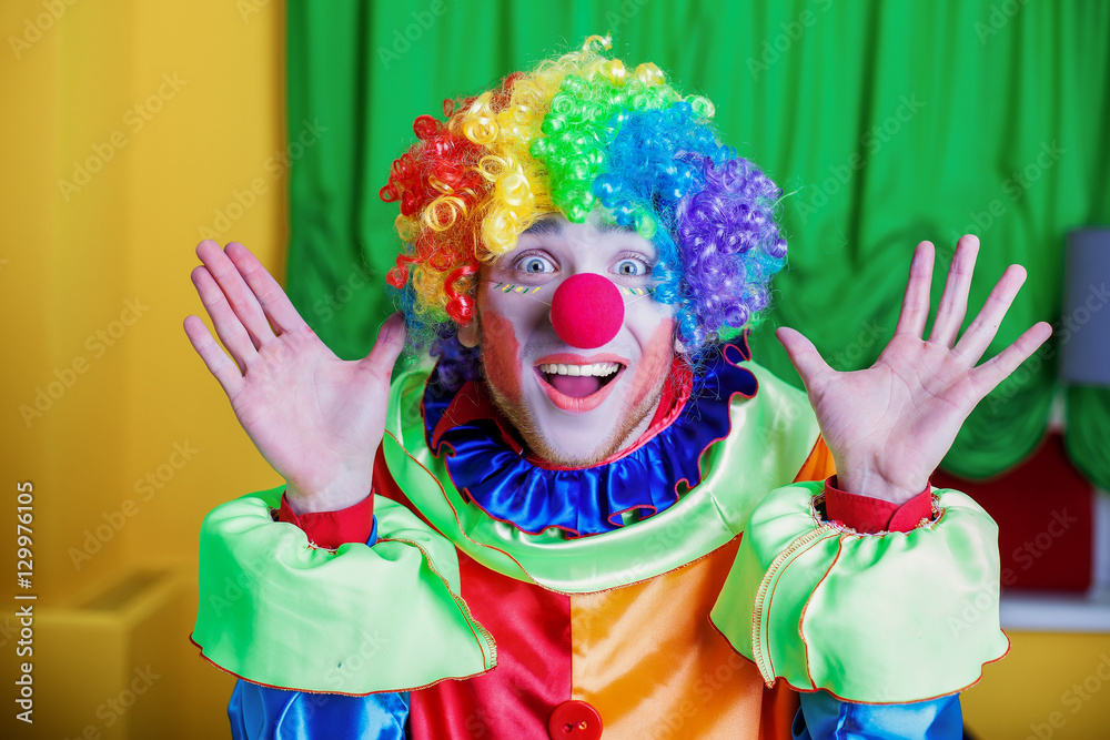 Clown with queer expression on his face. 