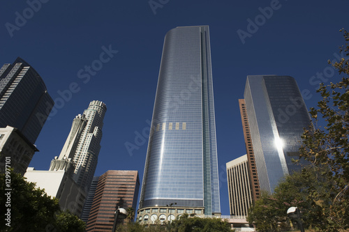 Low angle view of tall office buildings at business district, California, USA