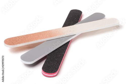 Three nail file with a different abrasive isolated on white background