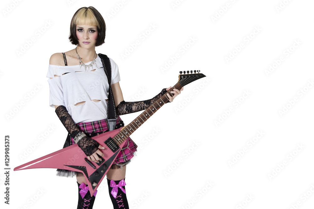 Portrait of beautiful young woman posing with guitar over white background Portrait of beautiful young woman posing with guitar over white background