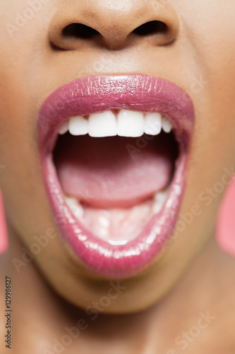 Cropped image of African American woman with mouth open